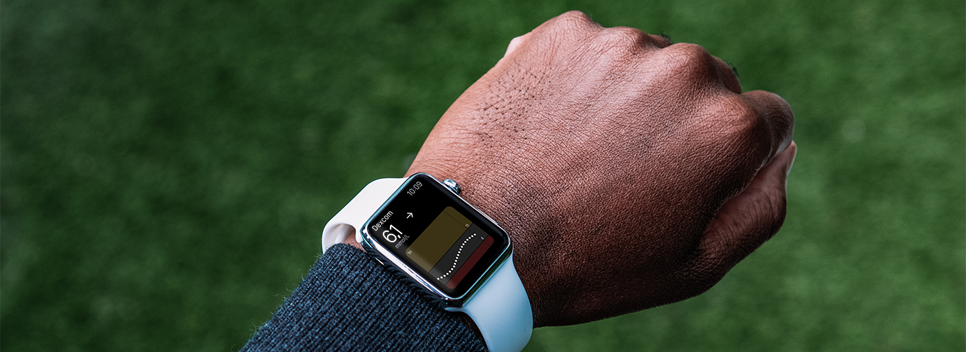 Montre intelligente affichant les données de glucose et leur tendance sur l'application Dexcom G6