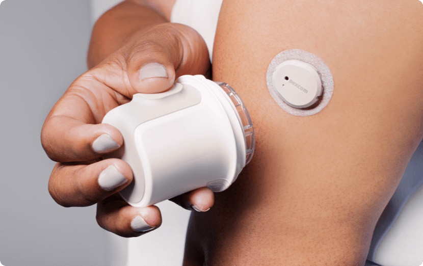 applicator and Dexcom G7 sensor