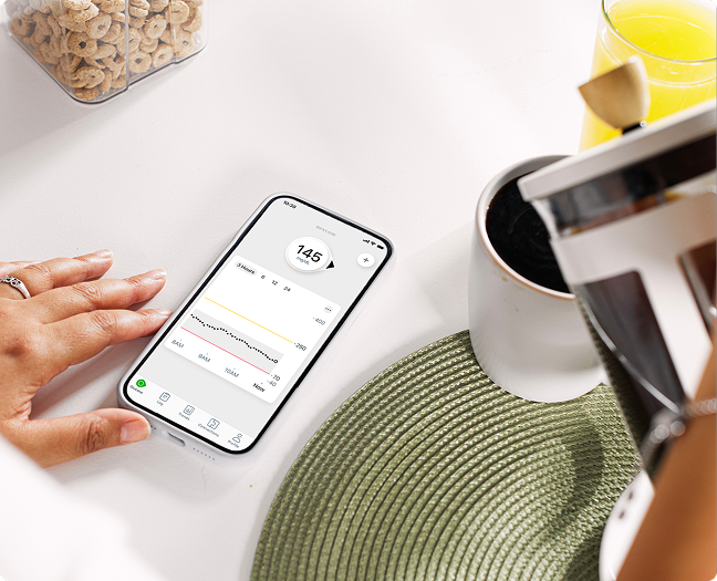 Pouring Coffee while checking readings on Phone
