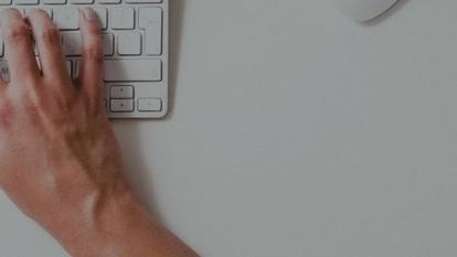 Hands on a computer keyboard