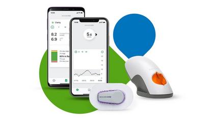 Dexcom one products with iPhone and Samsung phones showing 5.6 reading