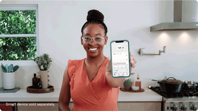 Kim Rose showing her glucose readings on the dexcom app - smart device sold separately