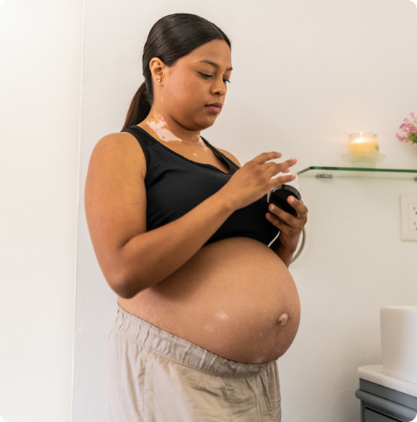pregnant woman going through morning routine 