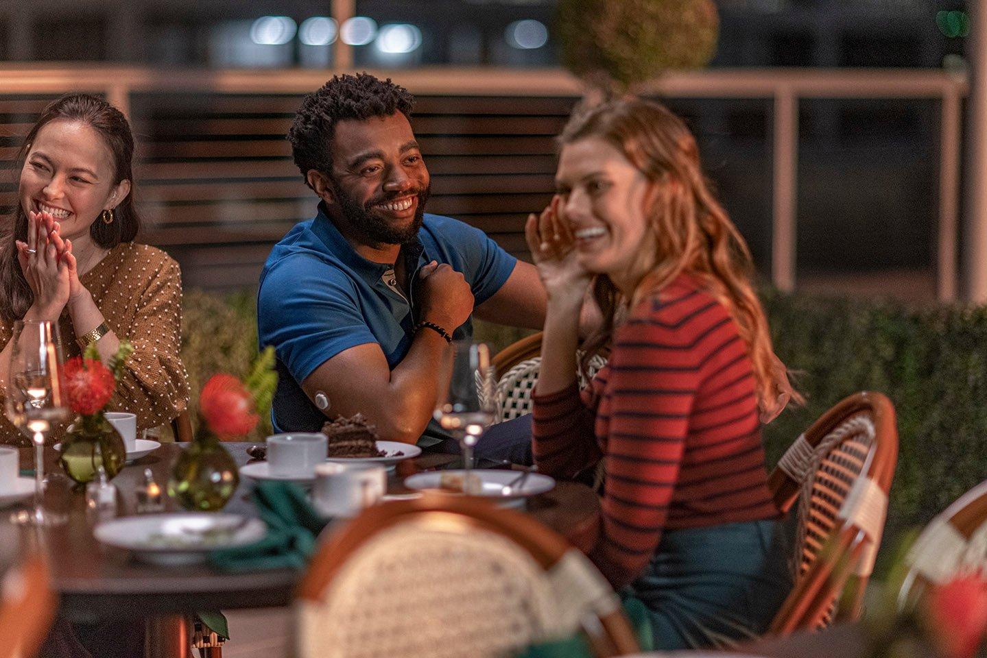 Couple enjoying dinner on a balcony