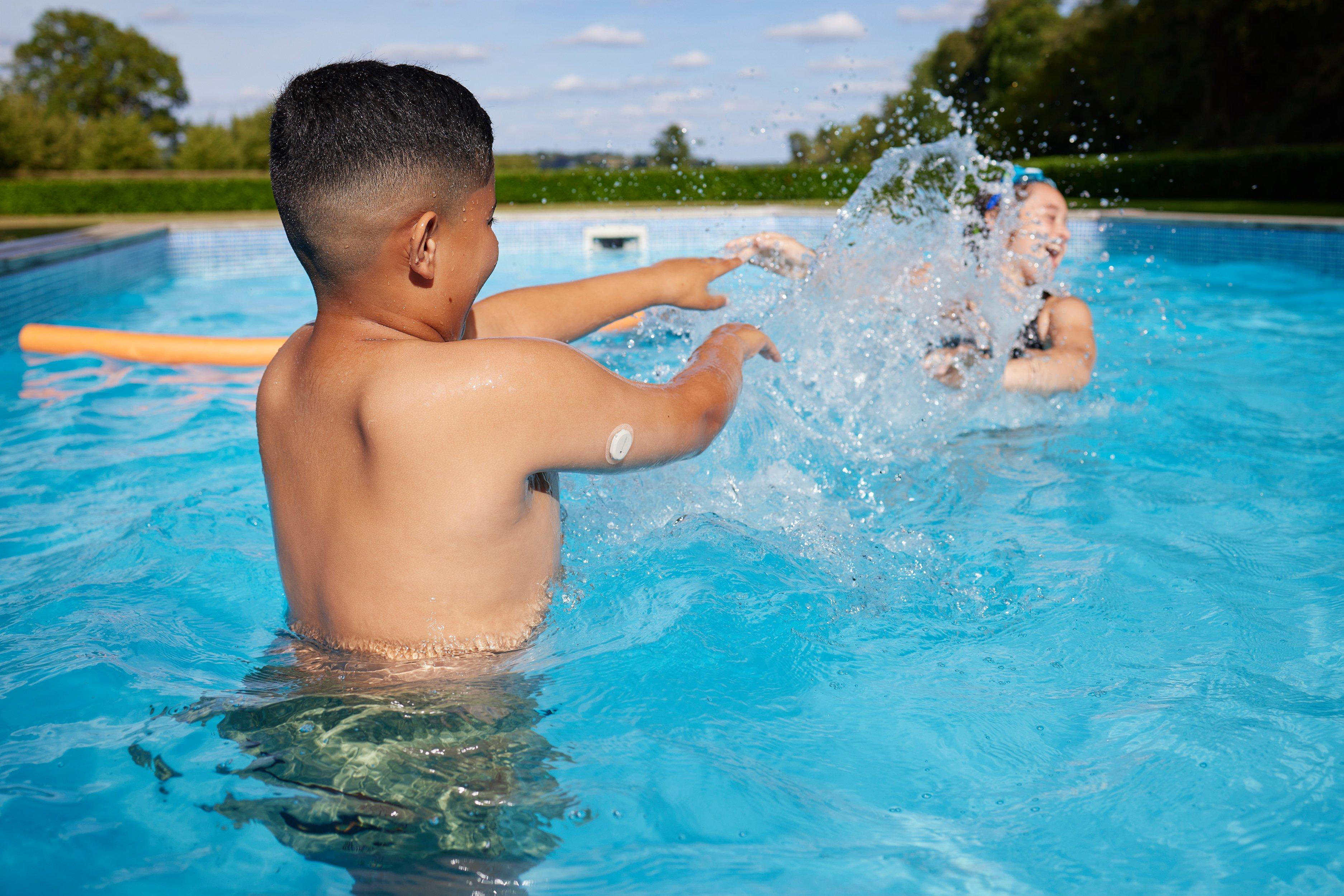 Children playing in pool