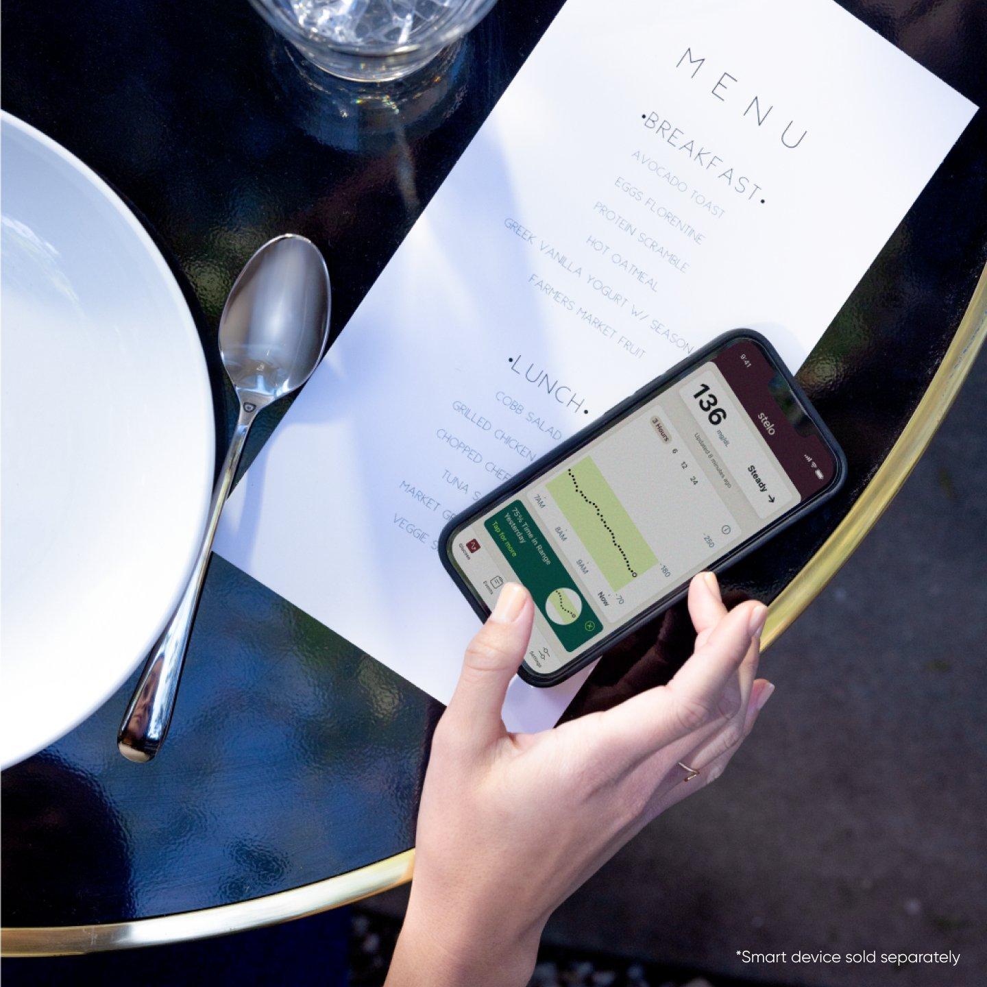 smartphone with Stelo app displayed