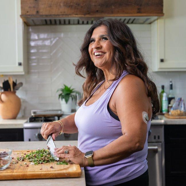woman cutting vegetables