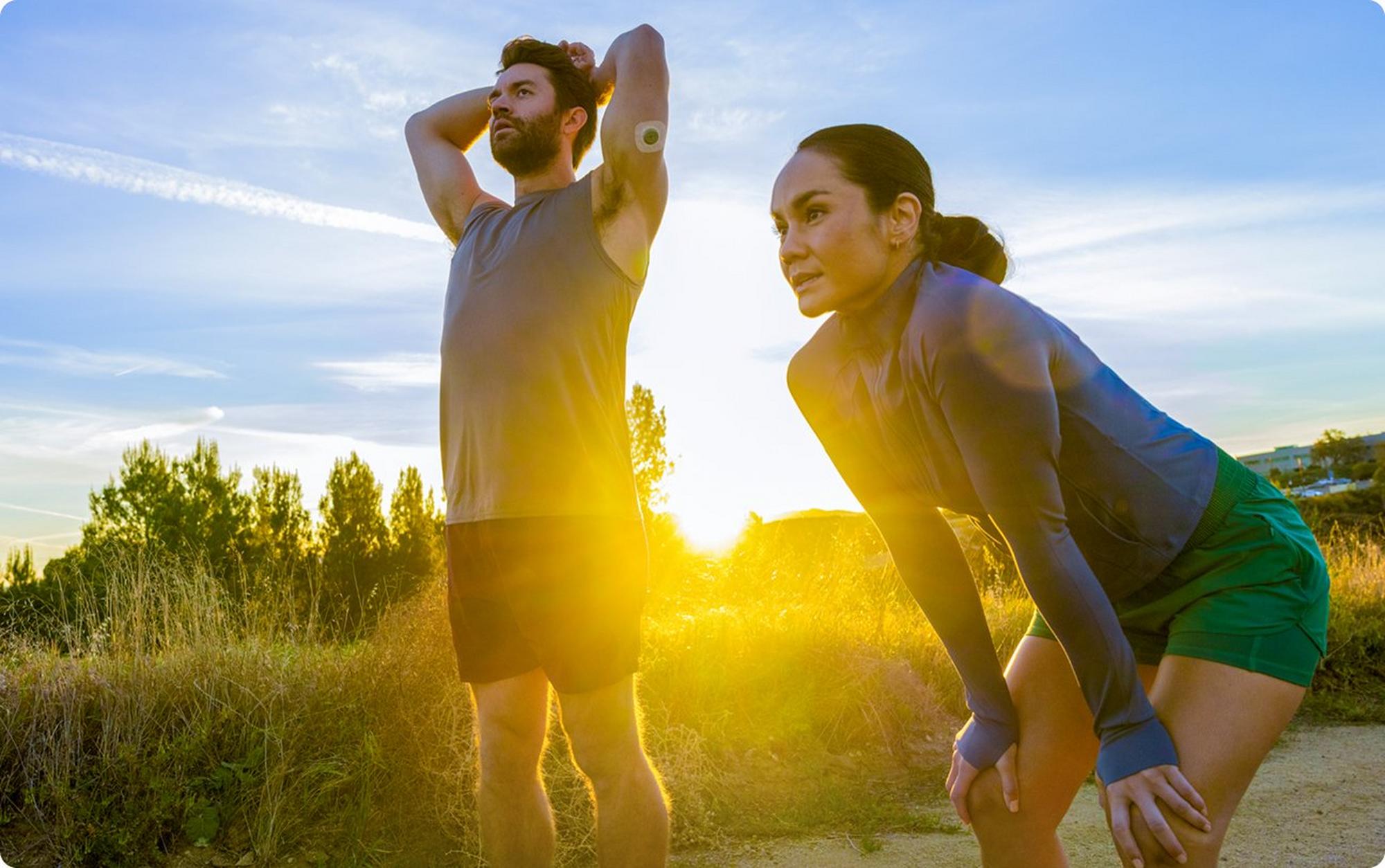 couple working out together outside