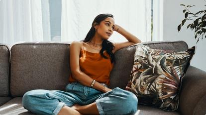 woman sitting on couch