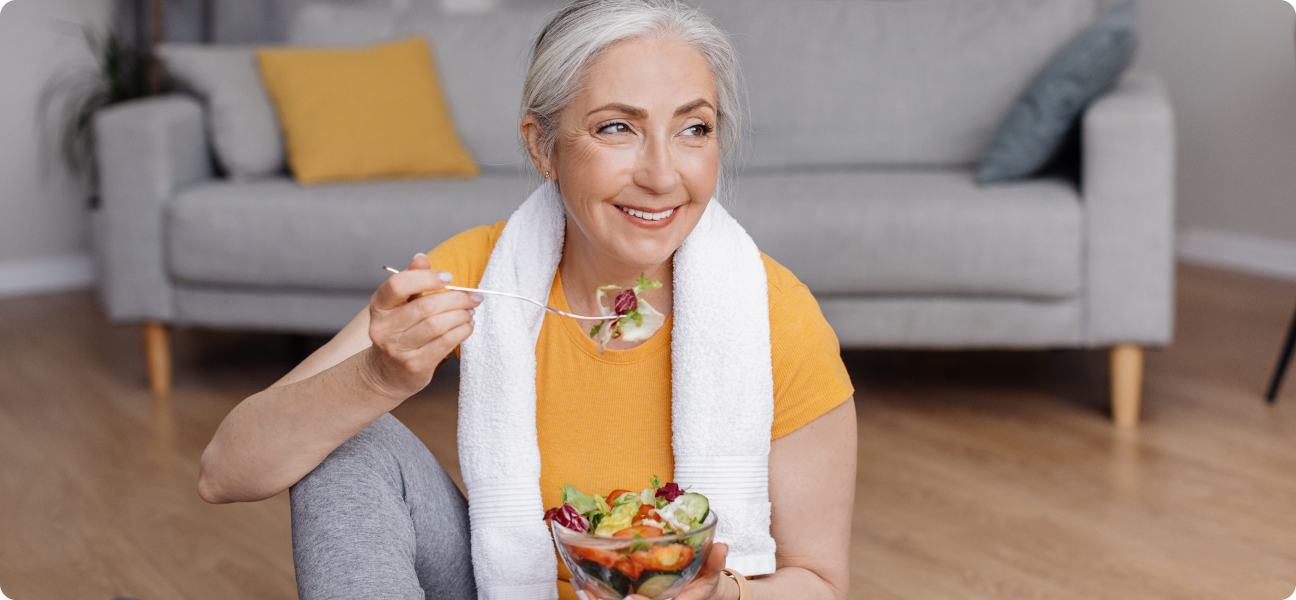 Person cutting strawberries in kitchen