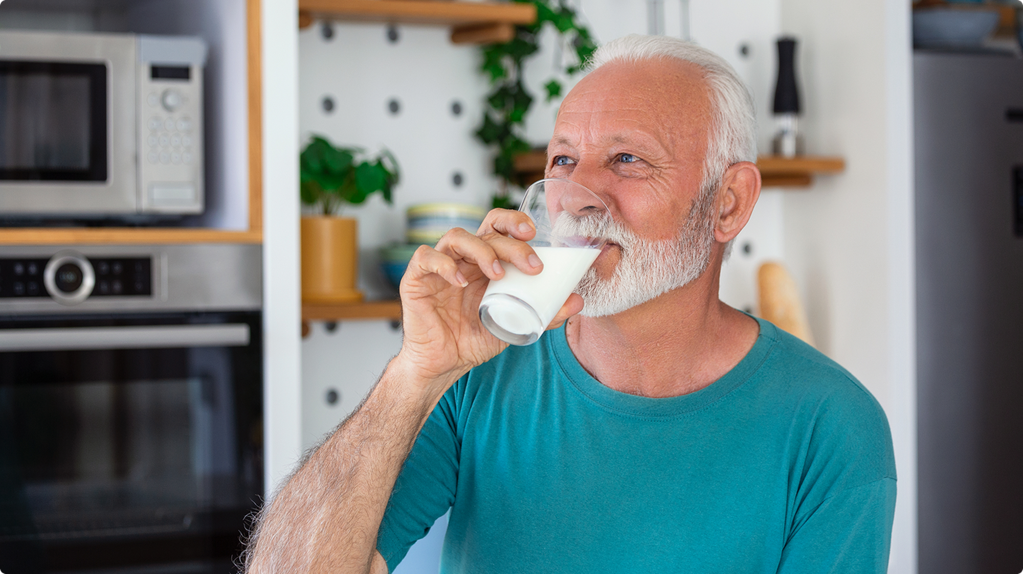 man drinking milk