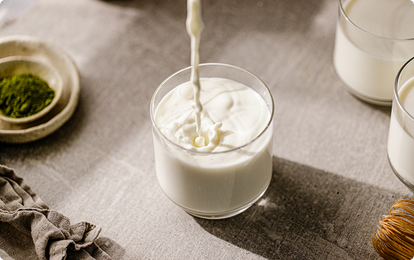 milk pouring into a glass