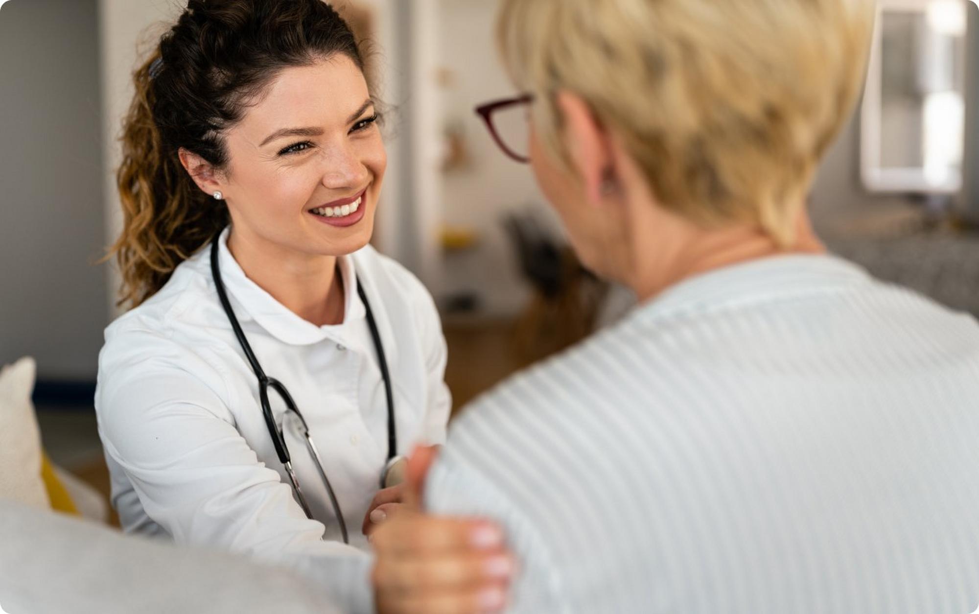 Female doctor smiling at patient