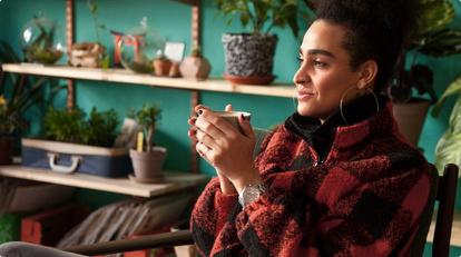 person drinking hot drink