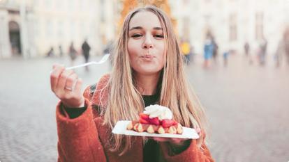 woman eating dessert