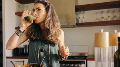 woman drinking healthy smoothie