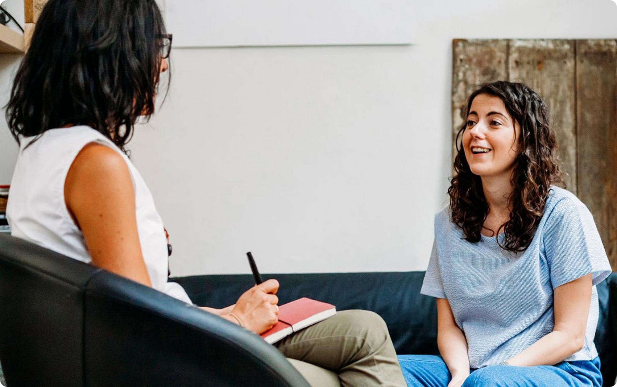 woman consulting healthcare worker about glucose management