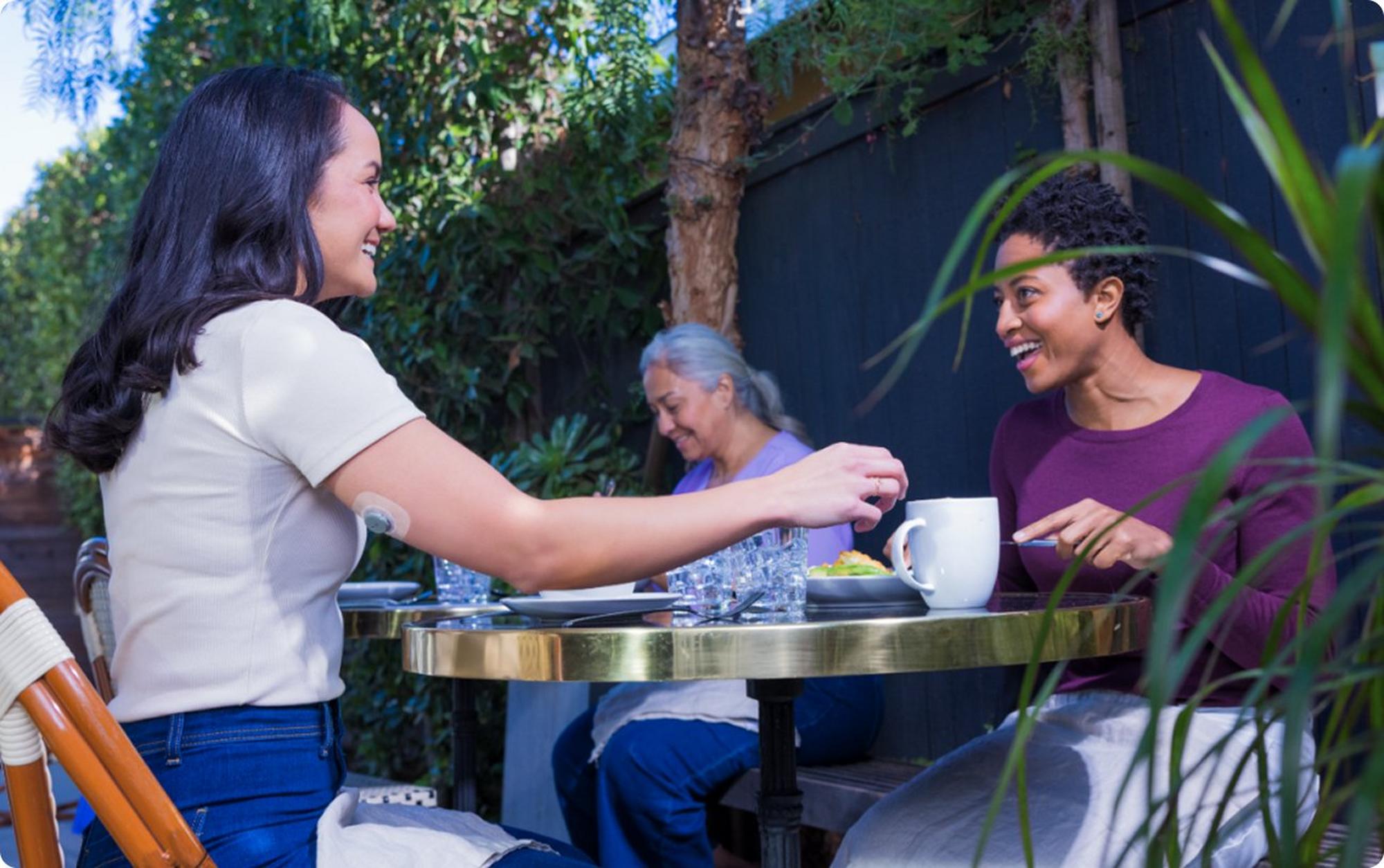 two woman eating a meal