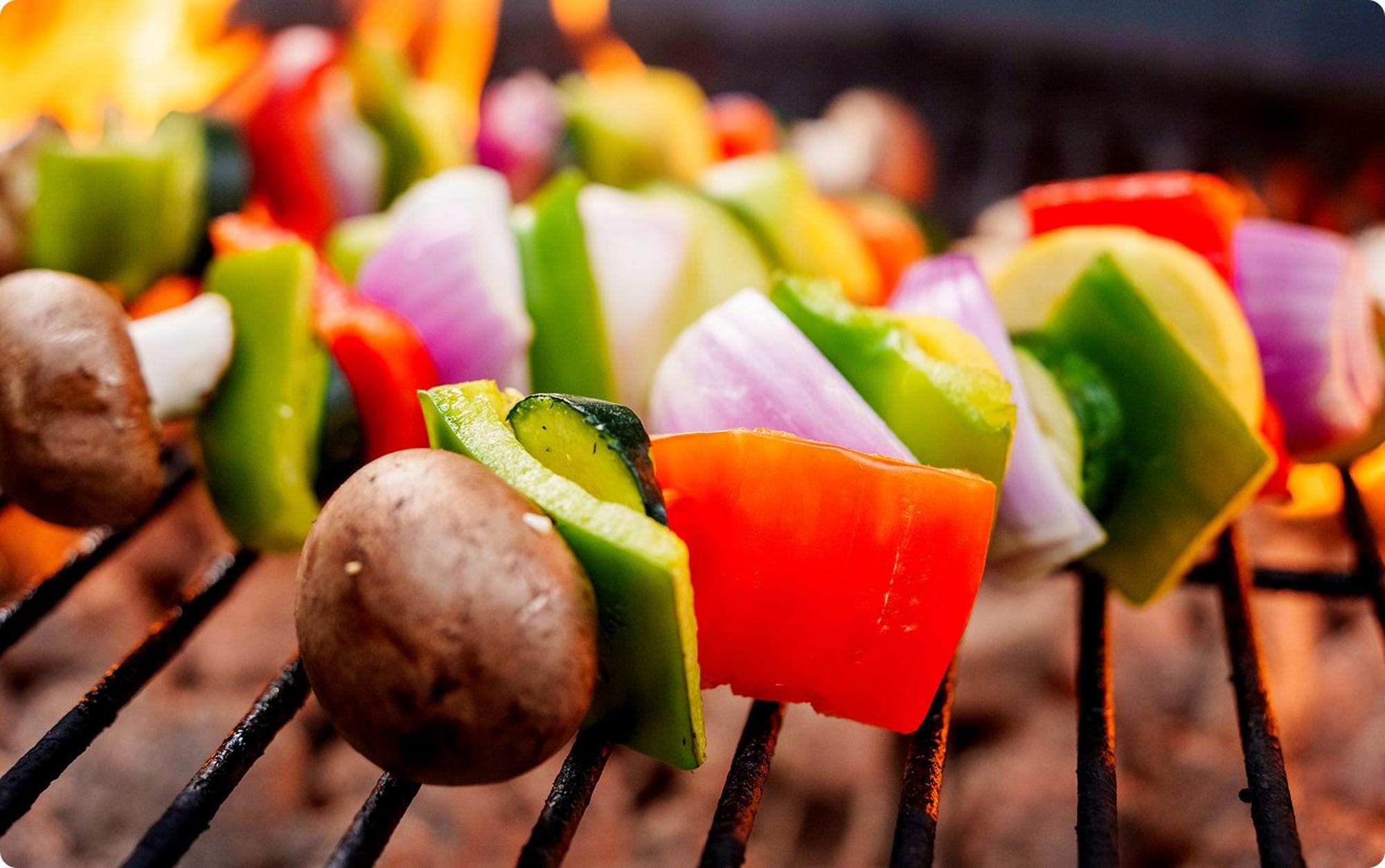 Grilled veggie skewers on grill