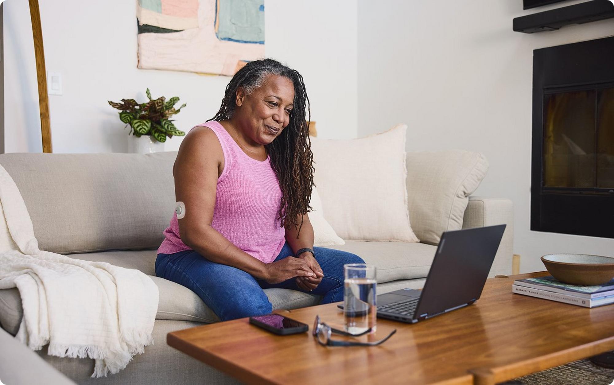 woman sitting at computer
