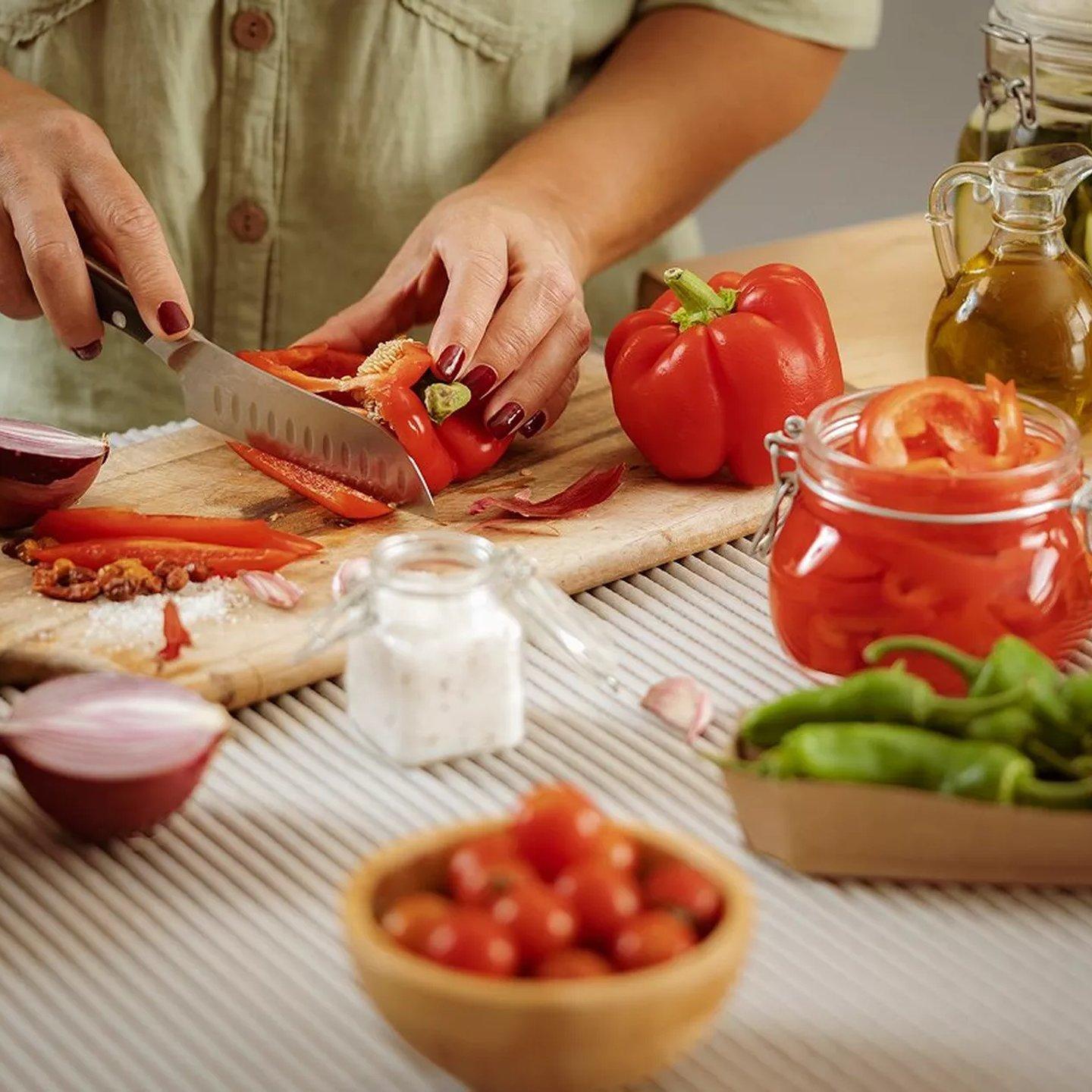 woman cutting vegetables
