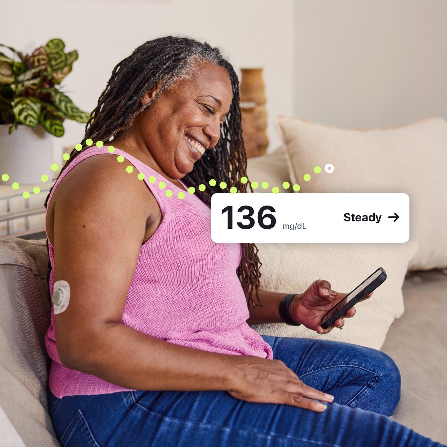 Female on couch with Stelo UI elements