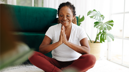 Senior woman practicing yoga