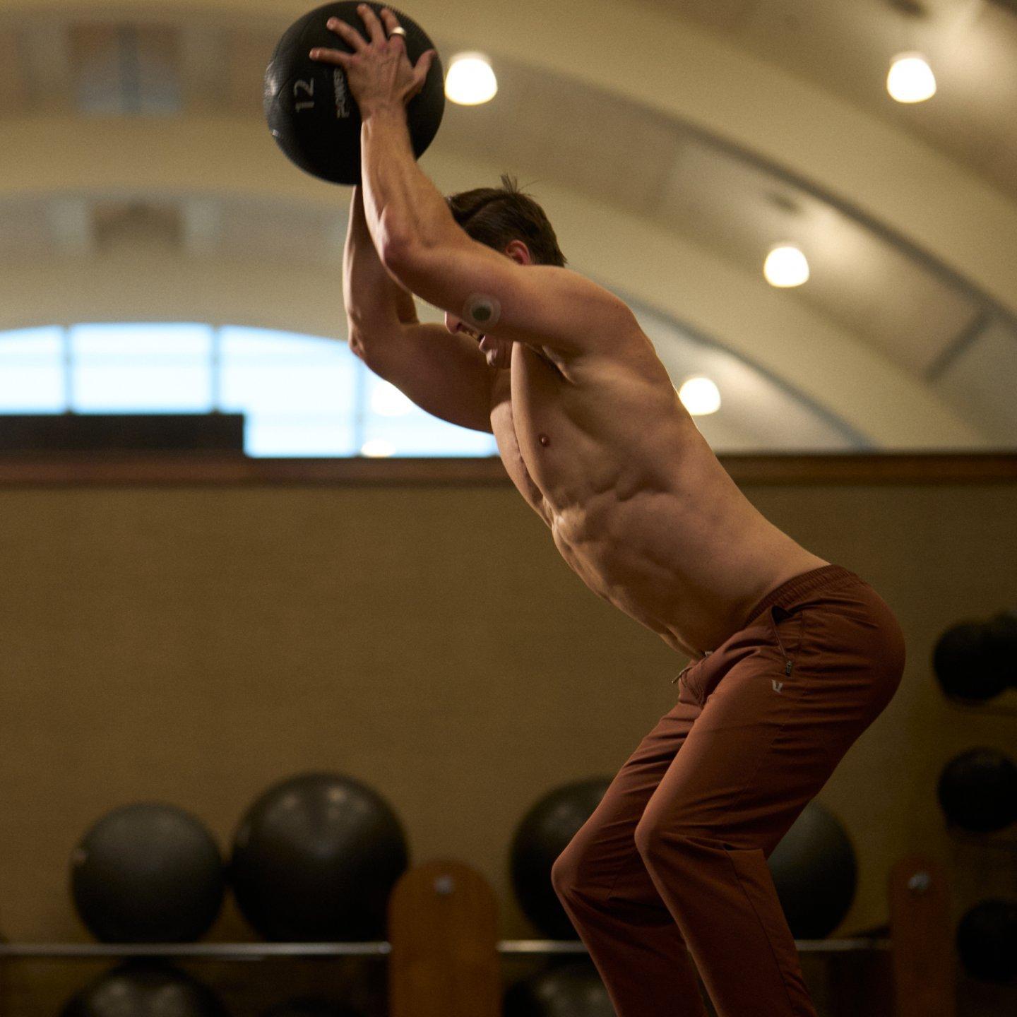 man with weighted ball