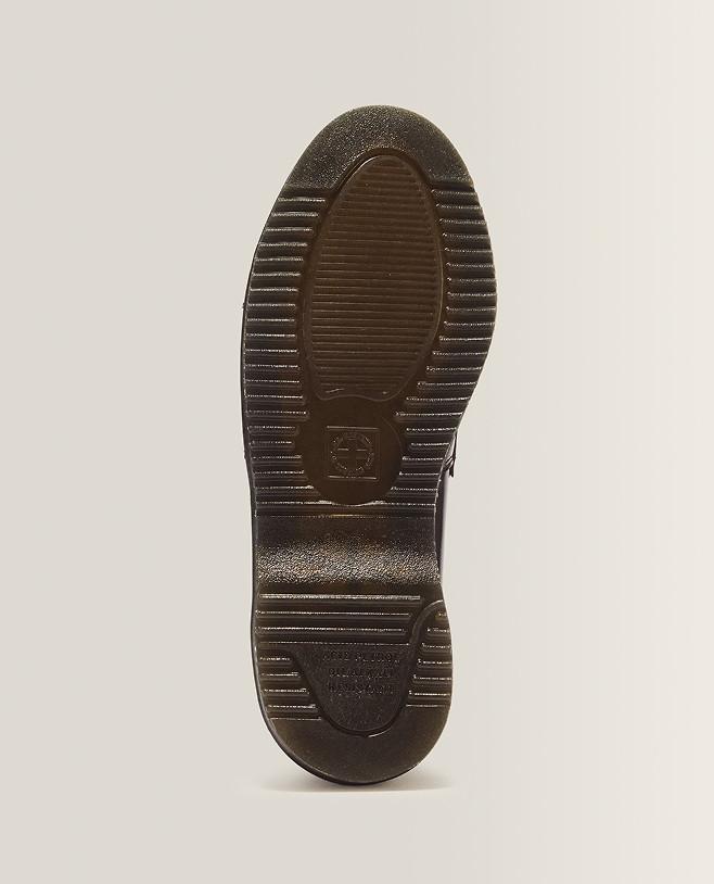 Suola nera in gomma con scanalature e inserto ovale antiscivolo
