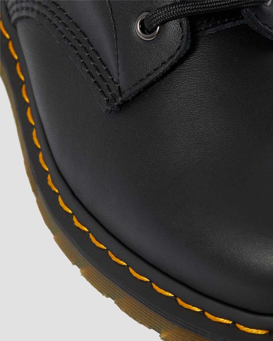 https://i1.adis.ws/i/drmartens/23561001.87.jpg?$large$1460 Softy T Leather Lace Up Boots Dr. Martens