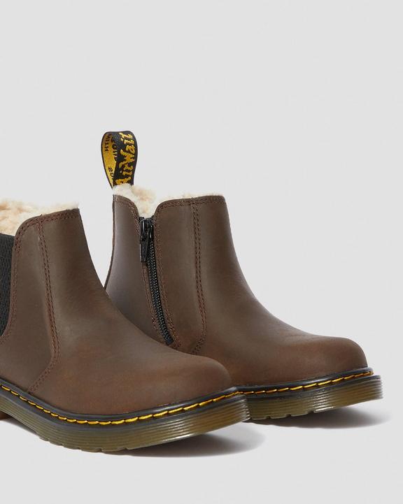 https://i1.adis.ws/i/drmartens/25100201.87.jpg?$large$2976 LEONORE JUNIOR FAUX FUR LINED BOOTS Dr. Martens