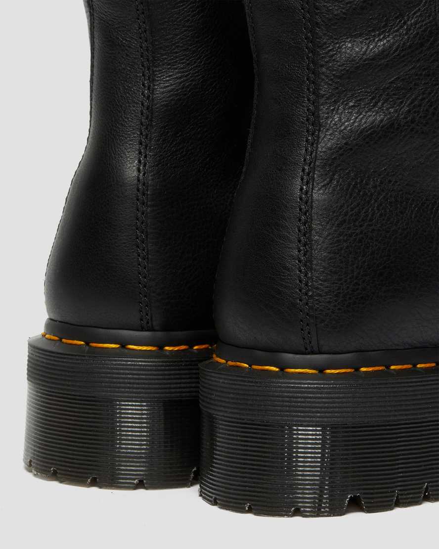 Jadon-platformstøvler i læder med imiteret pelsforing i sortJadon-platformstøvler i læder med imiteret pelsforing Dr. Martens