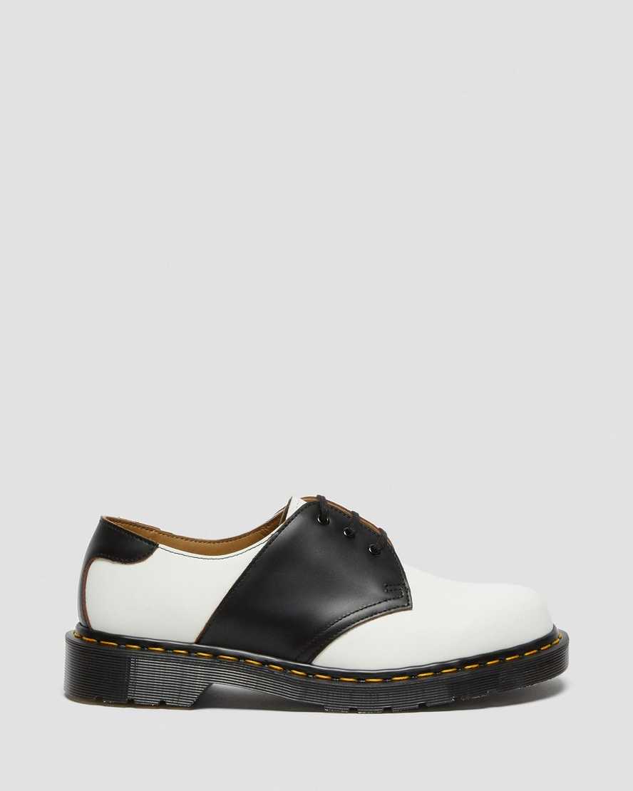 https://i1.adis.ws/i/drmartens/26710101.87.jpg?$large$1461 Leather Saddle Shoes Dr. Martens