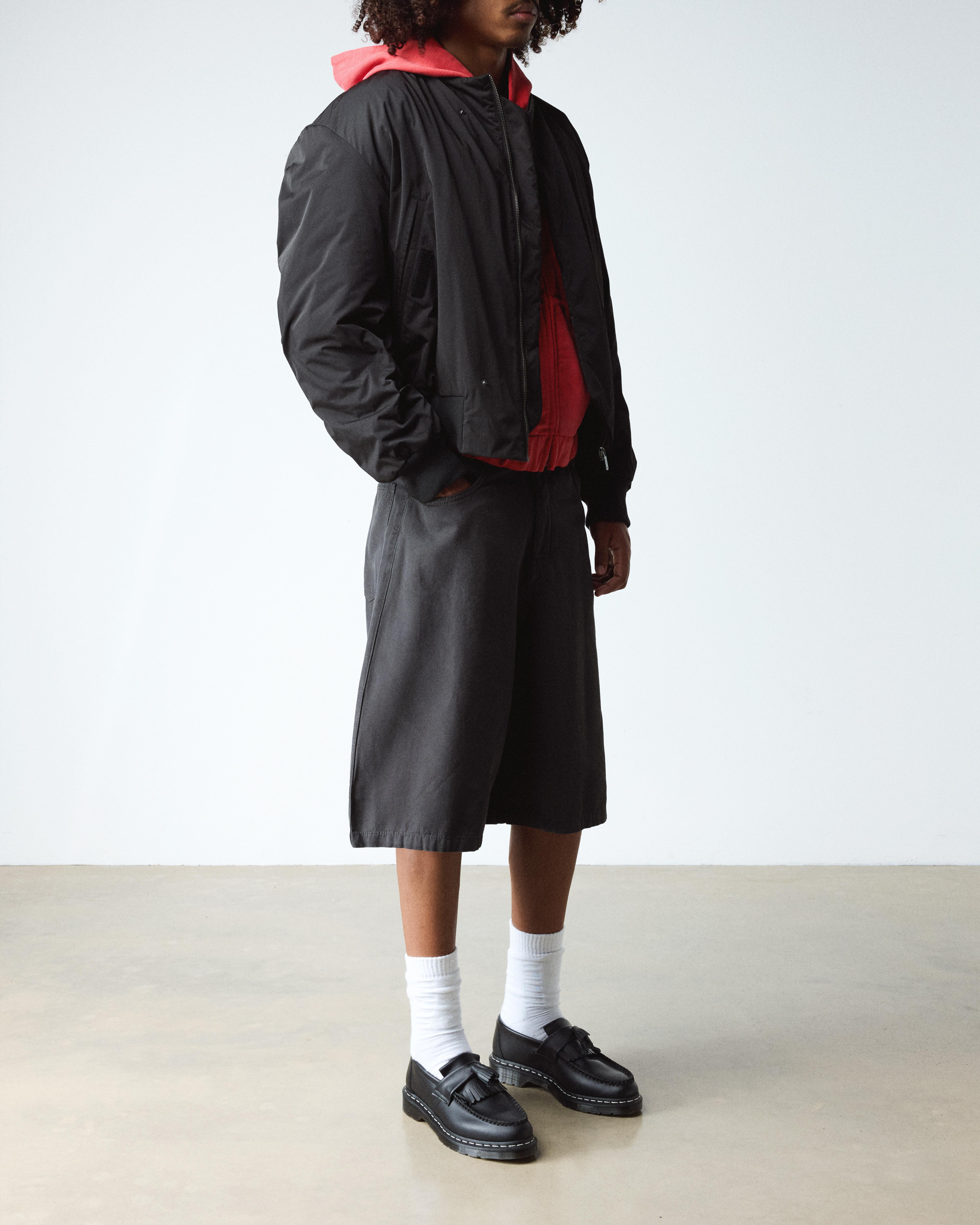 Adrian White Stitch Smooth Leather Loafers in Black