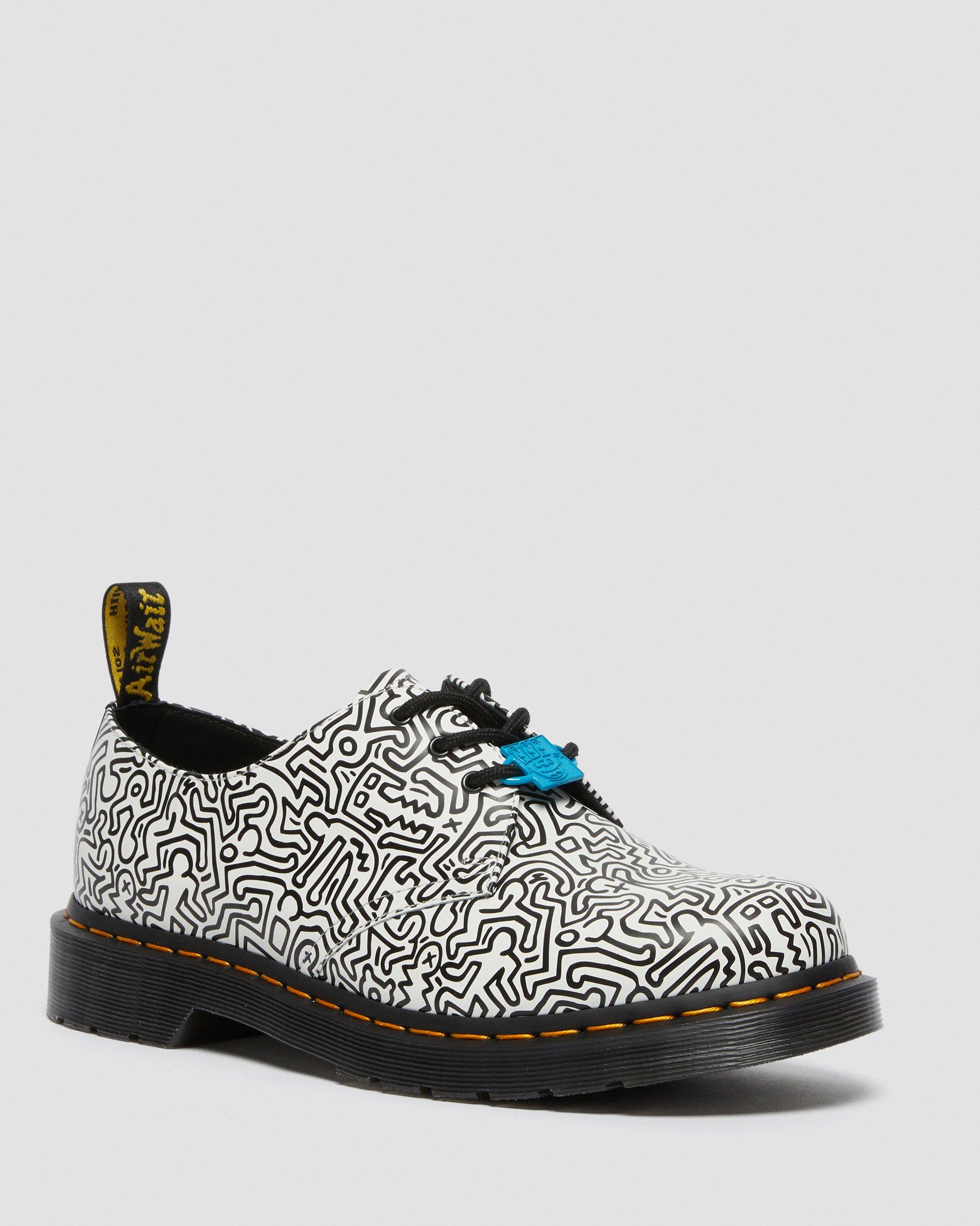 https://i1.adis.ws/i/drmartens/26833009.88.jpg?$large$1461 Keith Haring Black & White Printed Leather Shoes Dr. Martens