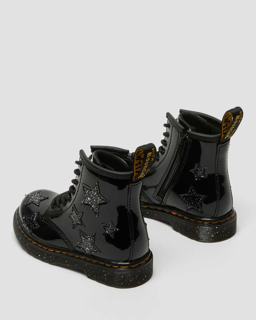 https://i1.adis.ws/i/drmartens/27057001.88.jpg?$large$Toddler 1460 Glitter Star Patent Lace Up Boots | Dr Martens