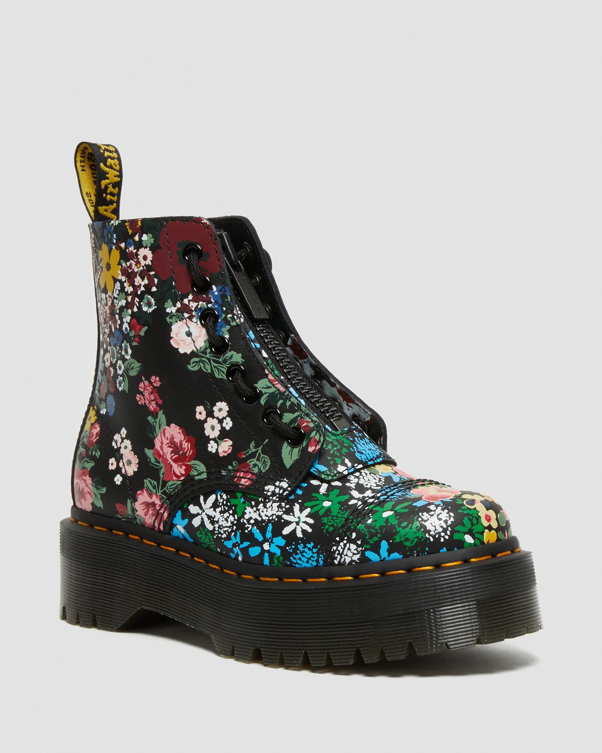 Botas con plataforma Sinclair en piel con estampado floral en Negro Dr. Martens