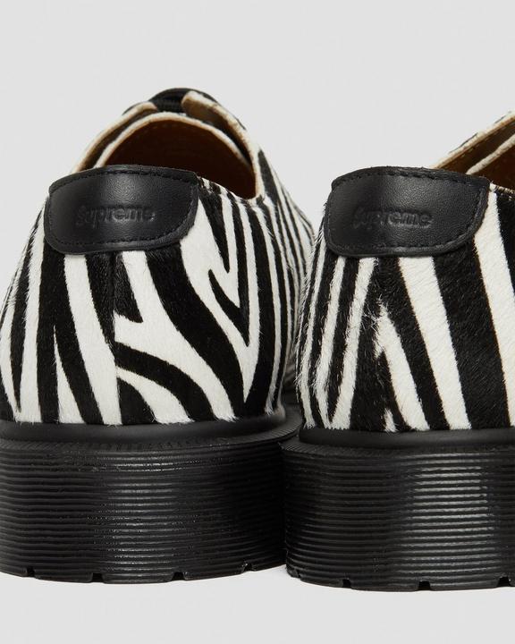 https://i1.adis.ws/i/drmartens/27151009.88.jpg?$large$2046 SUPREME® Zebra Shoes Dr. Martens
