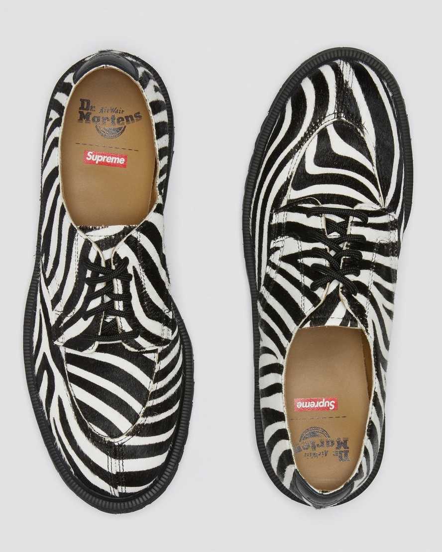 https://i1.adis.ws/i/drmartens/27151009.88.jpg?$large$2046 SUPREME® Zebra Shoes Dr. Martens