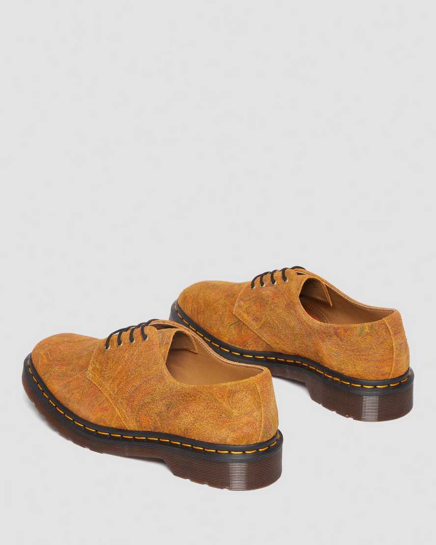 Smiths-sko i marmoreret ruskind i brunSmiths-sko i marmoreret ruskind Dr. Martens