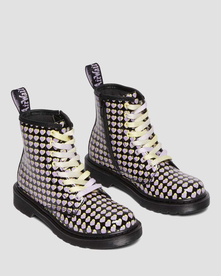 Junior 1460 Patent Heart Printed Lace Up BootsJunior 1460 Patent Heart Printed Lace Up Boots Dr. Martens