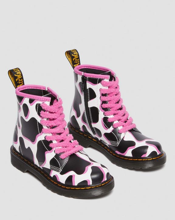 Junior 1460 Cow Print Patent Leather Lace Up BootsJunior 1460 Cow Print Patent Leather Lace Up Boots Dr. Martens
