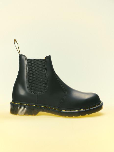 Black leather Chelsea boot with elastic side panels, yellow welt stitching and chunky sole