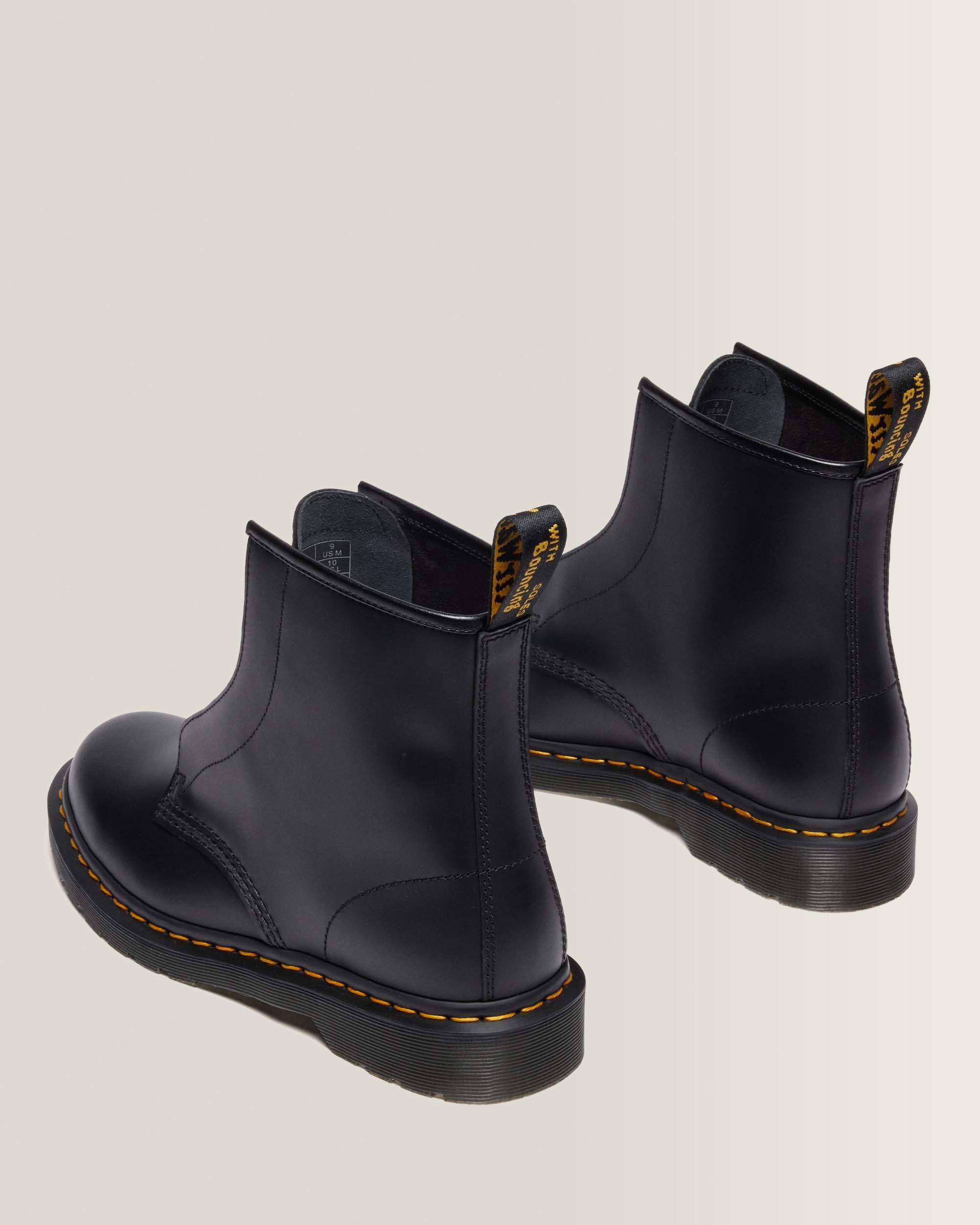 1460 LACELESS SMOOTH LEATHER SLIP ON BOOTS in Black