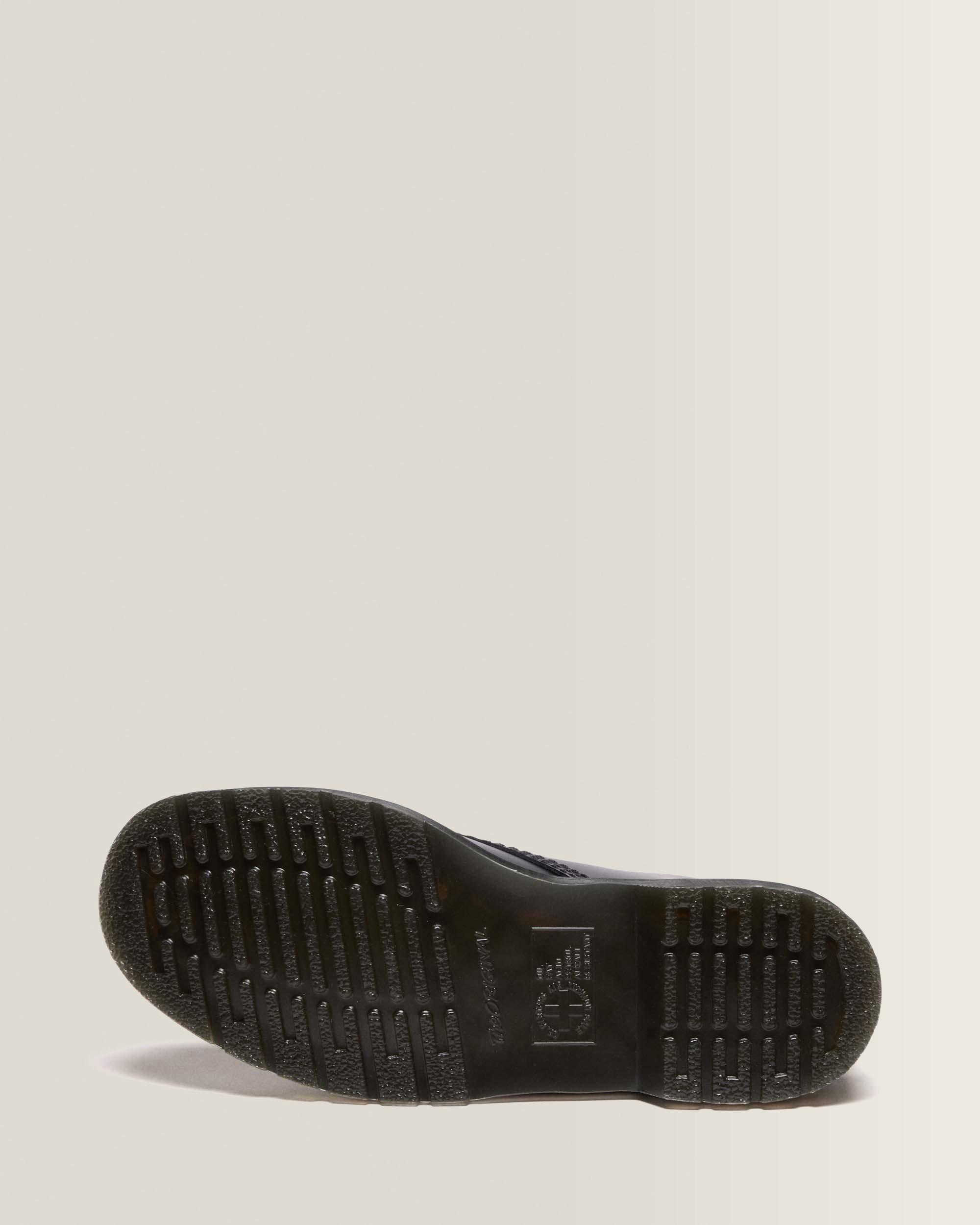 1460 LACELESS SMOOTH LEATHER SLIP ON BOOTS in Black