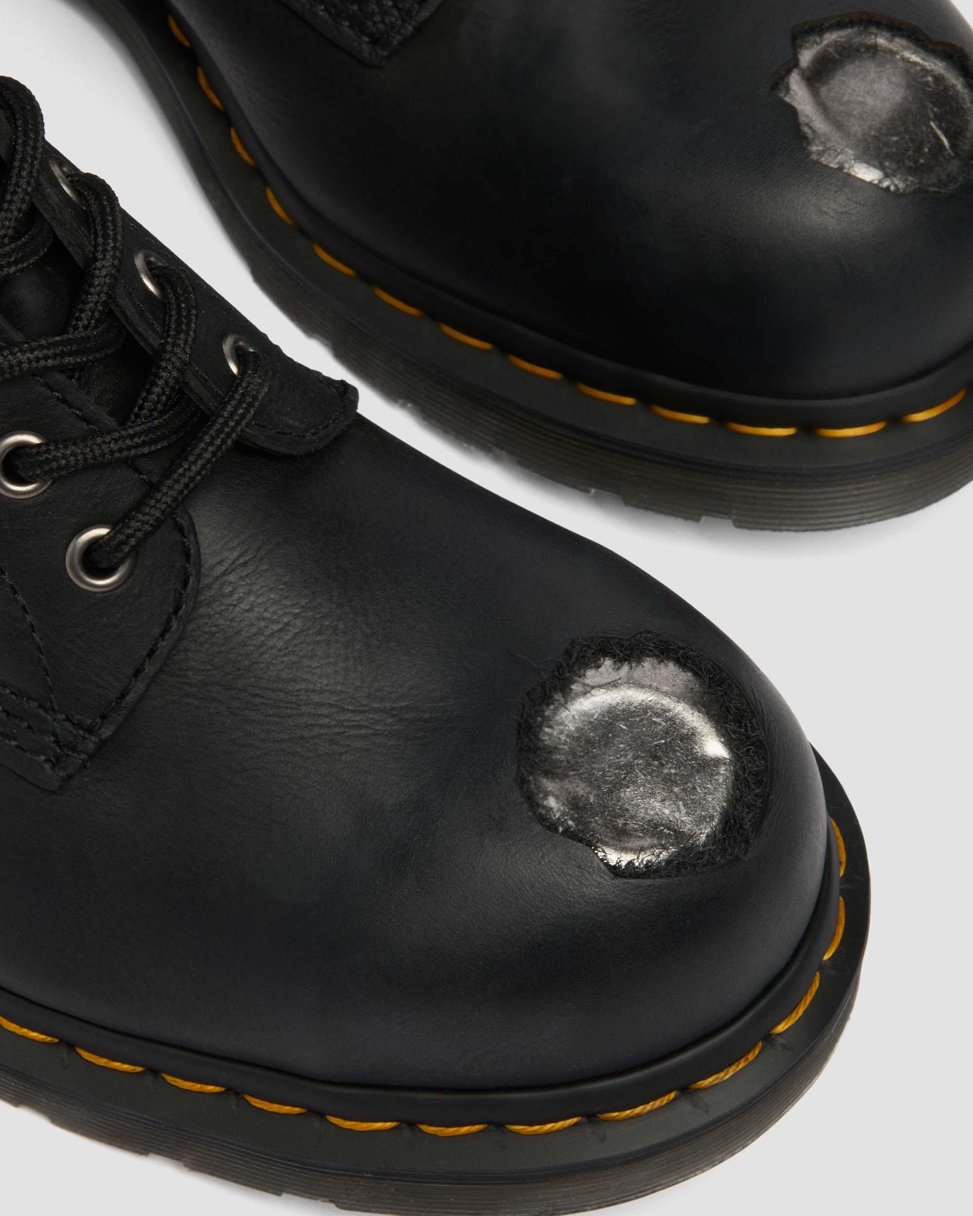 Stivali 1460 in pelle con puntale in metallo in Nero