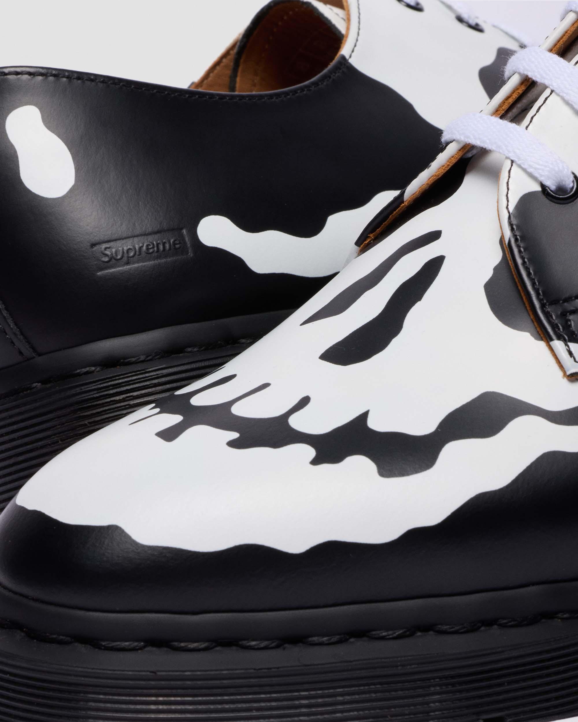 1461 SUPREME SKULL in Black | Dr. Martens display picture 1