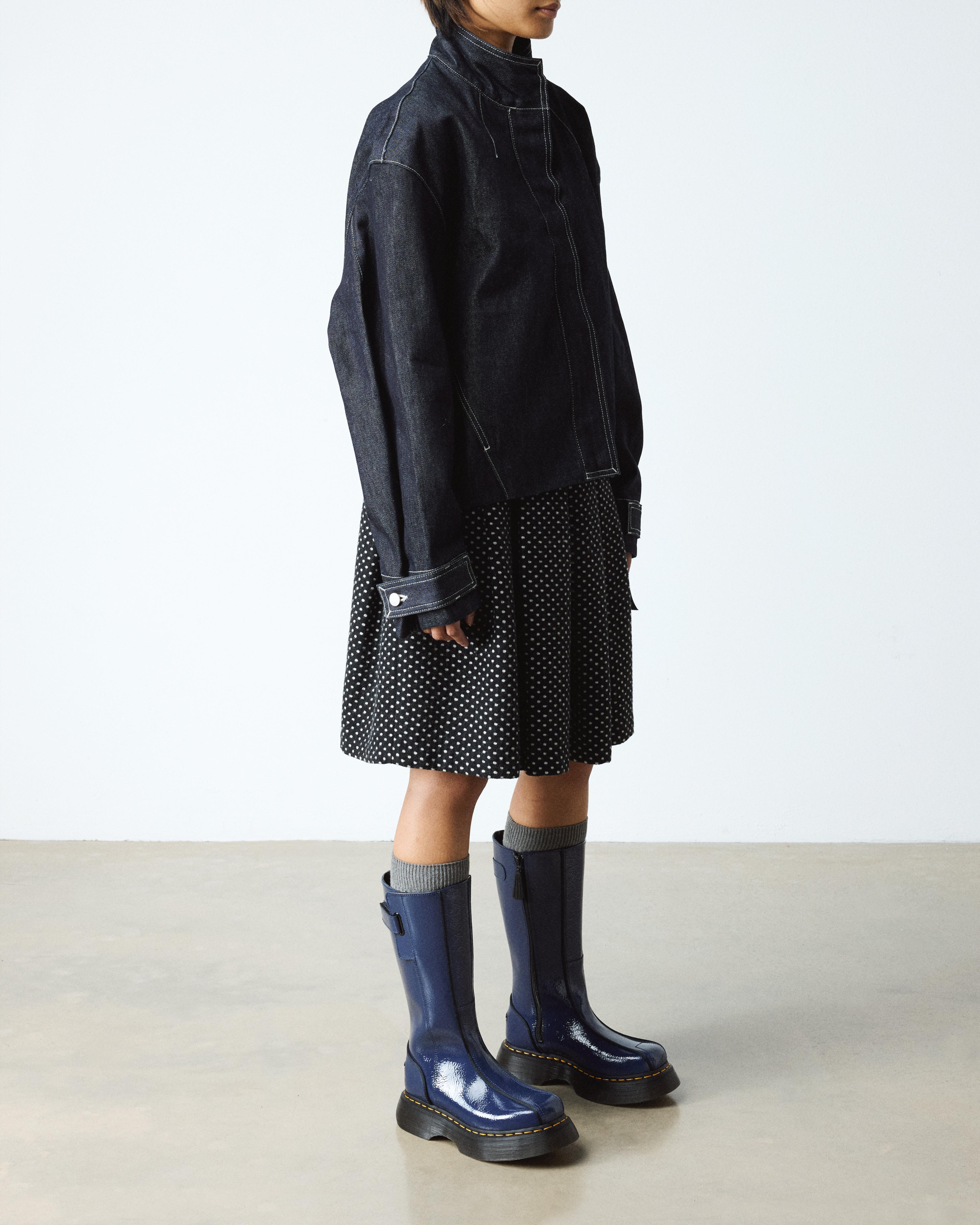 Dr. Martens Buzz Hi Distressed Patent Boots In Blue