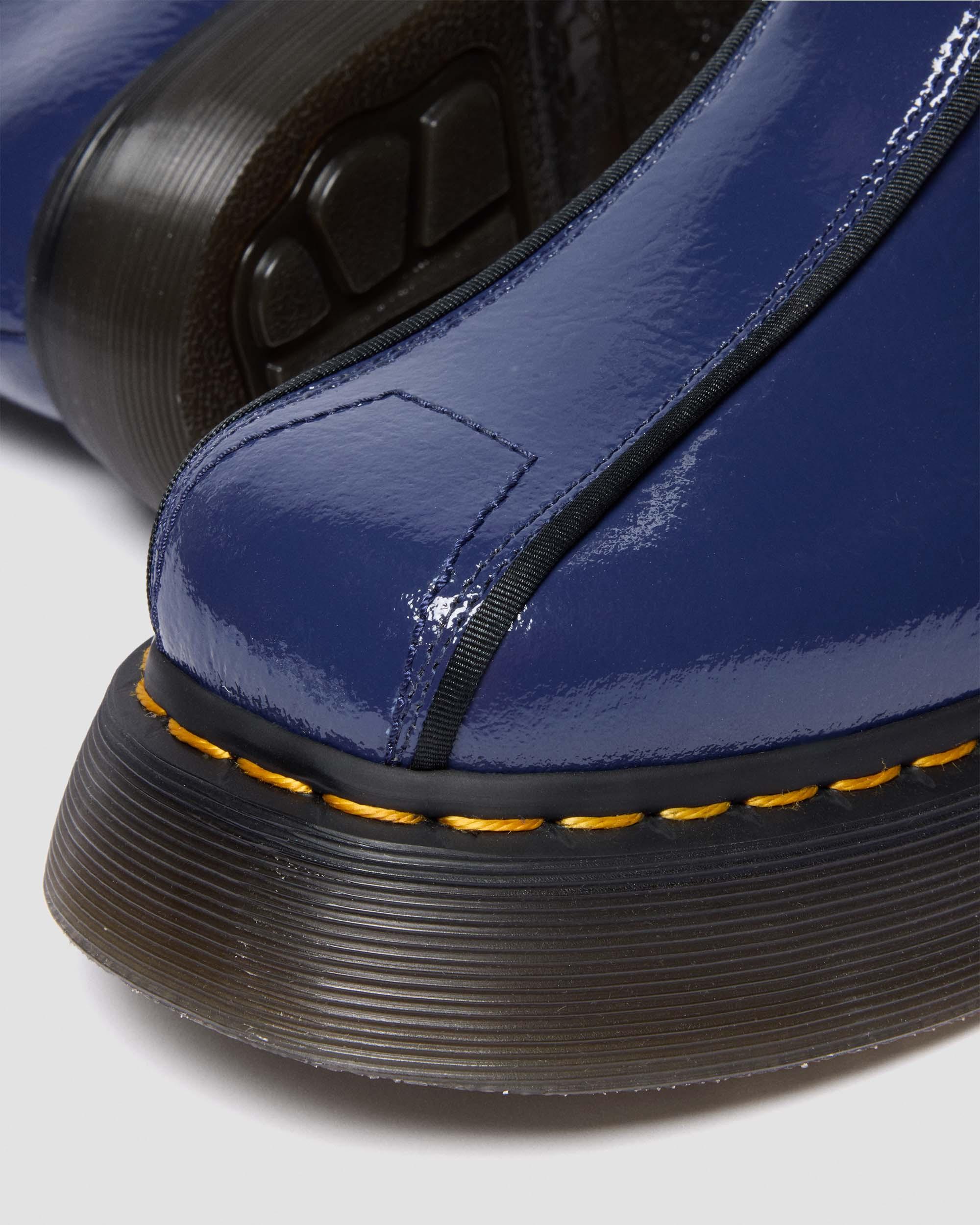 Dr. Martens Buzz Hi Distressed Patent Boots In Blue