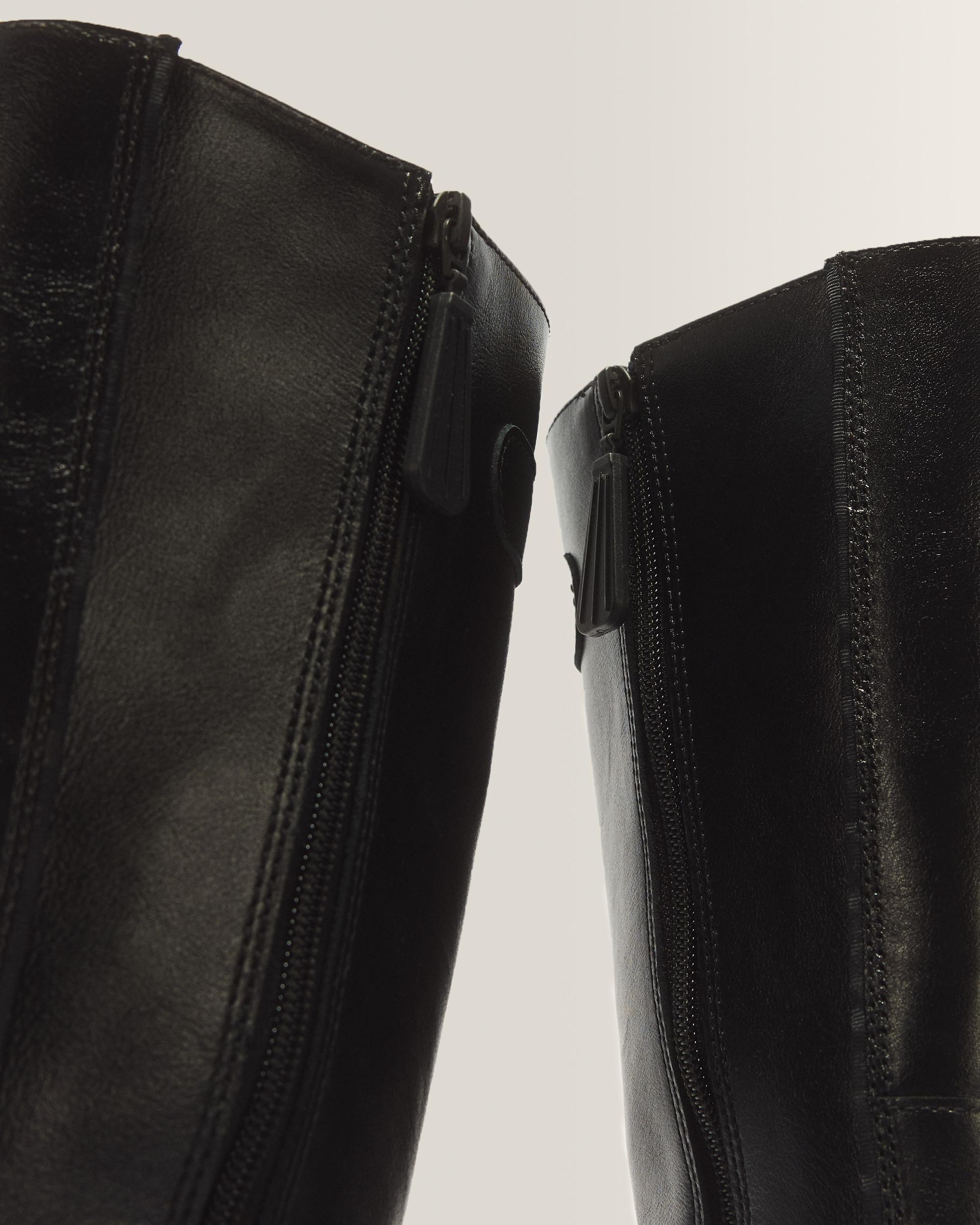 Buzz Hi Gloss Leather Boots in Black